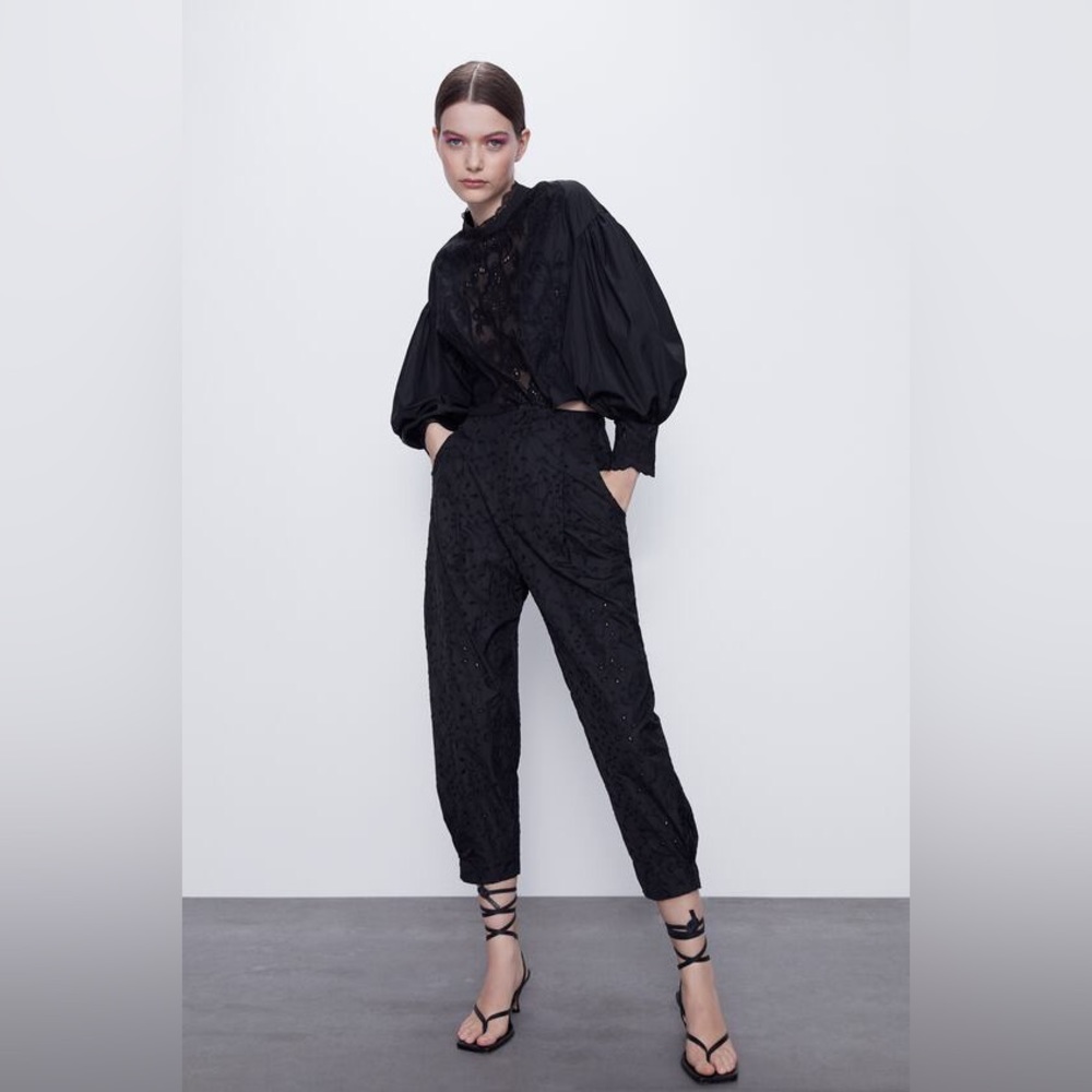 PANTS WITH PERFORATED EMBROIDERY